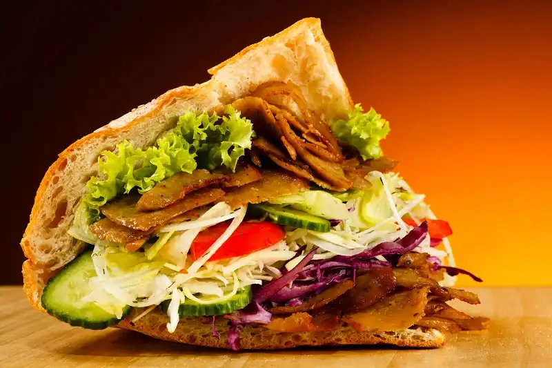 Kebab - grilled meat, bread and vegetables