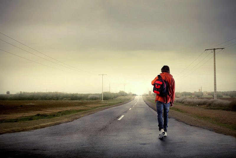 bigstock Young man walking on a country 13798088