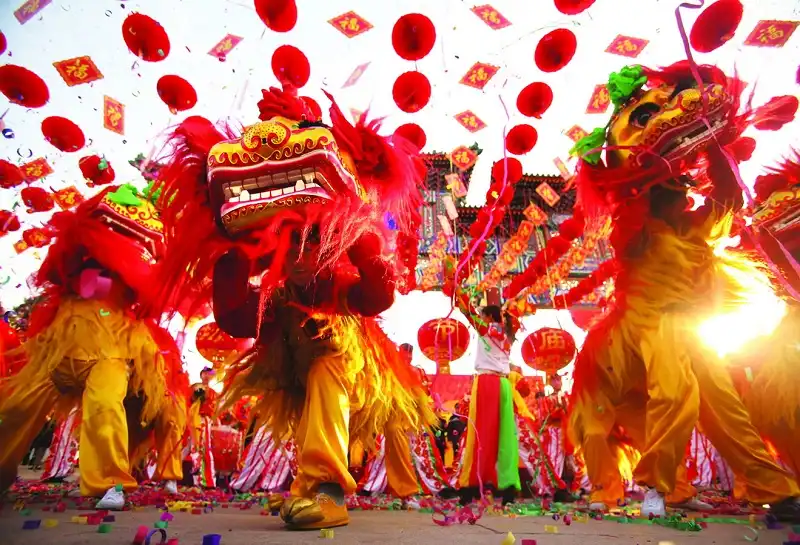 Chinese musicians and dancers perform a lion dance under red lantern decorations during the opening ceremony of the Spring Festival Temple Fair at the Temple of Earth in Beijing February 2, 2011. Chinese New Year, or Spring Festival, is China's biggest holiday, giving migrant workers their only chance of returning to their home provinces with gifts and money for the family. It represents the world's biggest annual mass migration of humans. UPI/Stephen Shaver