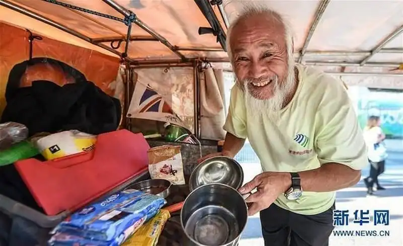 wanderlust-tips-nguoi-dan-ong-trung-quoc-60-tuoi-dap-xe-den-brazil-de-du-olympic-6