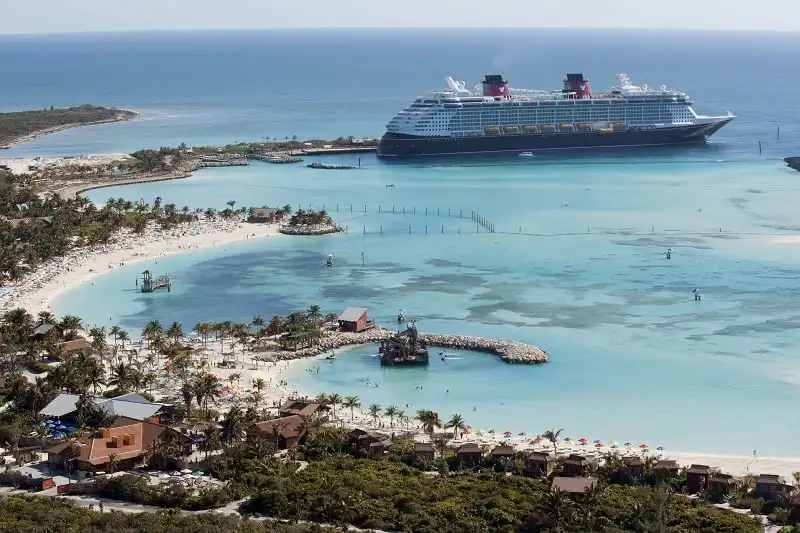 The Disney Dream docks at Castaway Cay, Disney's private island in the tropical waters of the Bahamas, reserved exclusively for Disney Cruise Line guests. In a setting of crystal-clear turquoise waters, powdery white-sand beaches and lush landscapes, the 1,000-acre island offers one-of-a-kind areas and activities for every member of the family. (David Roark, photographer)