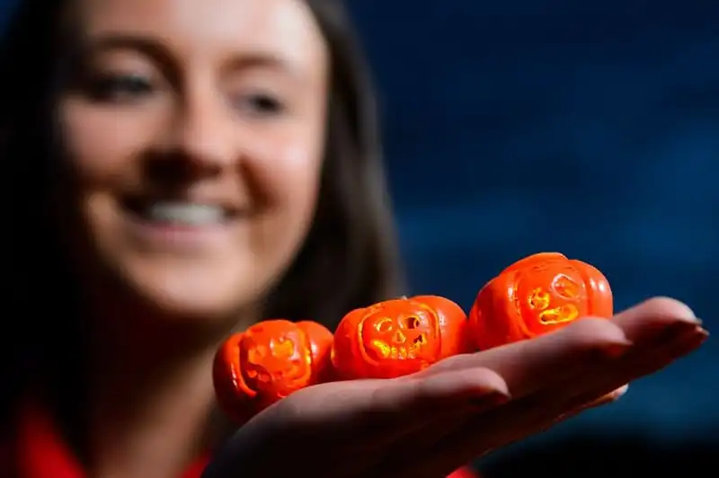 Model maker Melissa Maughan with miniature carved pumpkins at the LEGOLAND Windsor Resort.