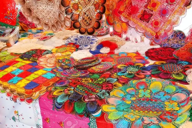 Display of nanduti at the street market in Asuncion, Paraguay. Nanduti is a traditional Paraguayan embroidered lace, introduced by the Spaniards