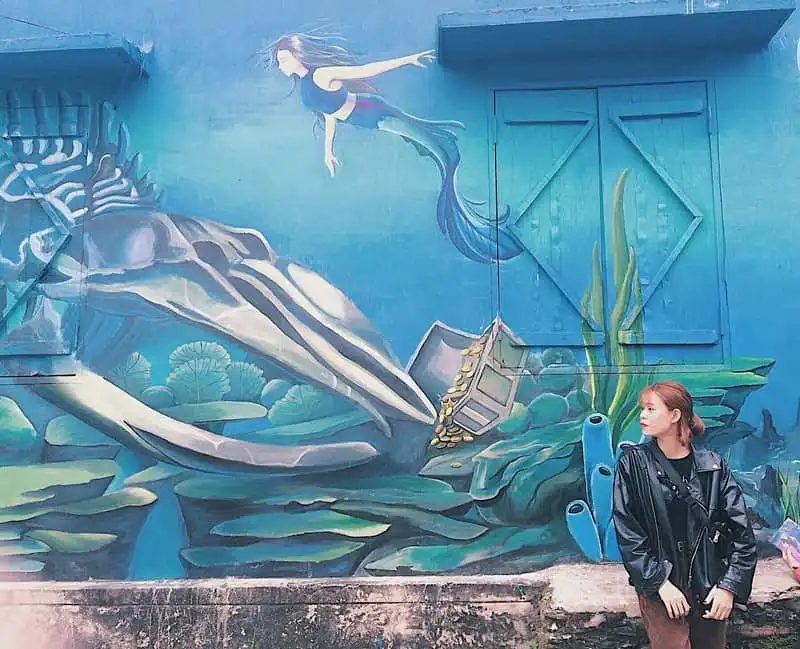 Tạp chí Du lịch Wanderlust Tips | Ngôi làng bích họa đẹp mộng mơ ở Quảng Bình