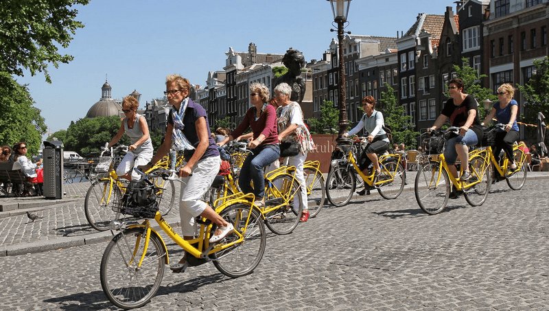 Tạp chí Du lịch Wanderlust Tips Kinh nghiệm khám phá Amsterdam bình yên và thơ mộng