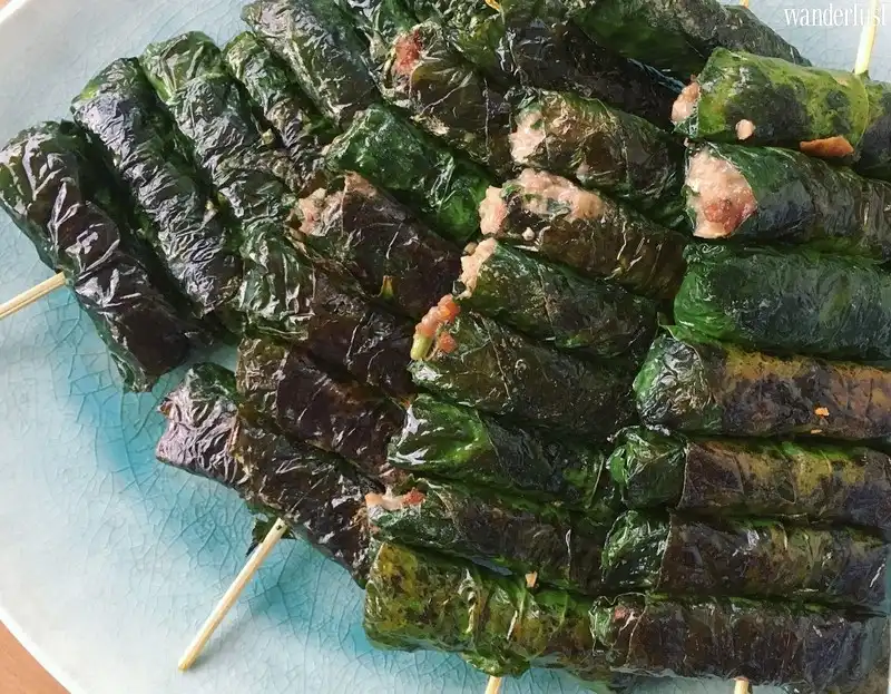 Tạp chí Du lịch Wanderlust Tips | Món chả cuốn lá bưởi lạ miêng của dân tộc Mường 