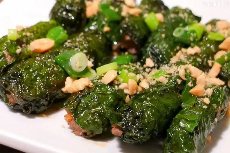 Tạp chí Du lịch Wanderlust Tips | Món chả cuốn lá bưởi lạ miêng của dân tộc Mường