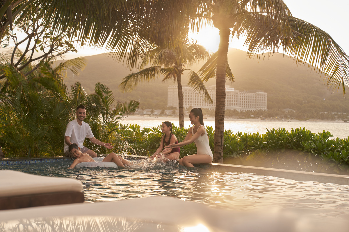 CXRHT Family have fun by Villa pool 2